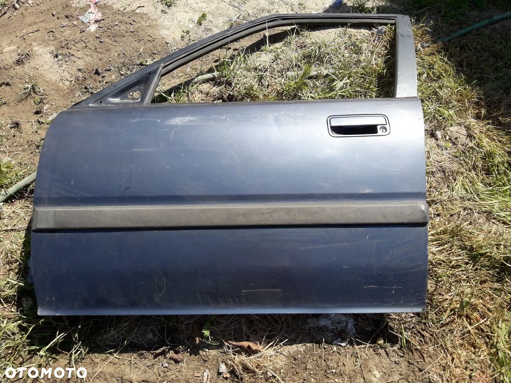 Honda Concerto   89-94  Drzwi przednie lewe szyba - 1