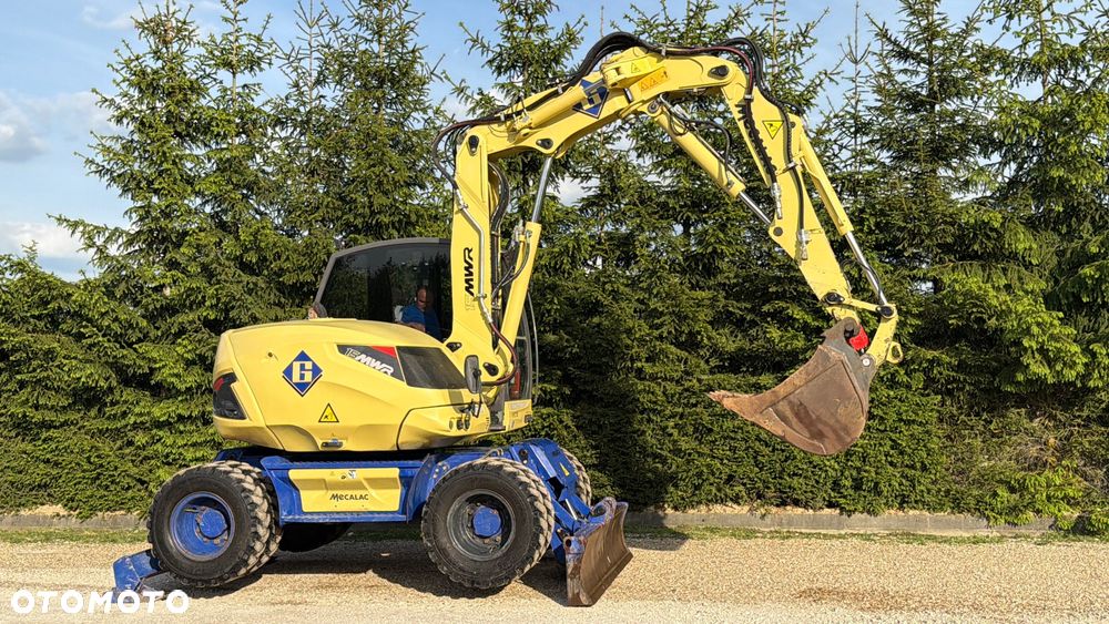 Mecalac Koparka 14 ton MECALAC 15 MWR koparko-ładowarka 3 łyżki widły 1 wł Centr.smarowanie Opony na BLIŹNIAKU 80%Camso ładowarka 714 12MTX 4x4 skrętne KLIMA kabina Premium silnik 146KM volvo EW140B DEUTZ szybka 35km/h - 22