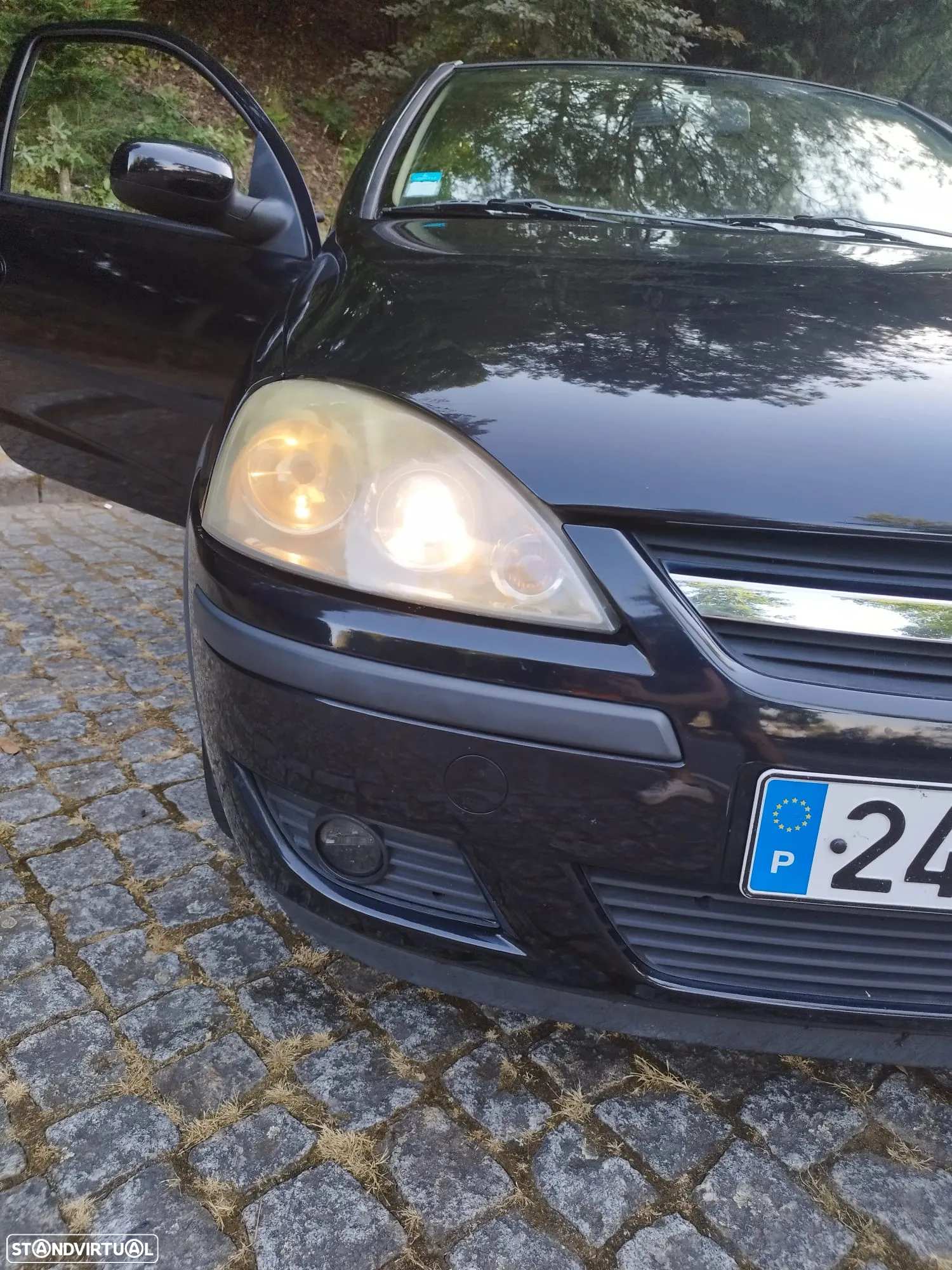Opel Corsa 1.2 16V Enjoy - 21