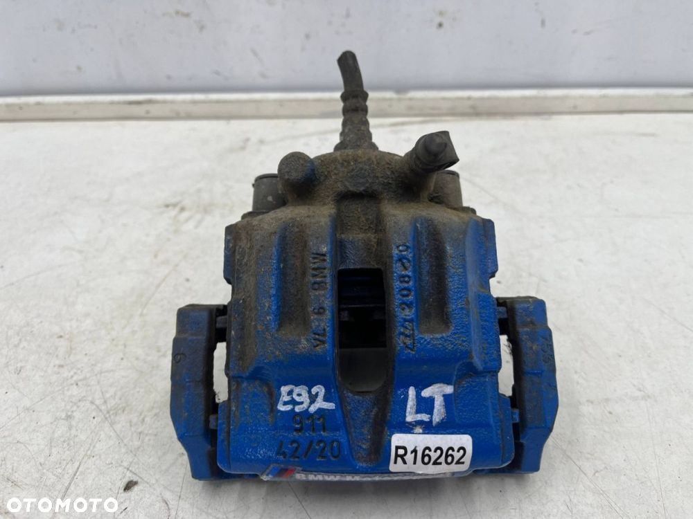 Zacisk hamulcowy BMW E81 E82 X1 E84 E90 E91 E92 E93 lewy tylny jarzmo lewy tył na tarcze 300 mm. - 1