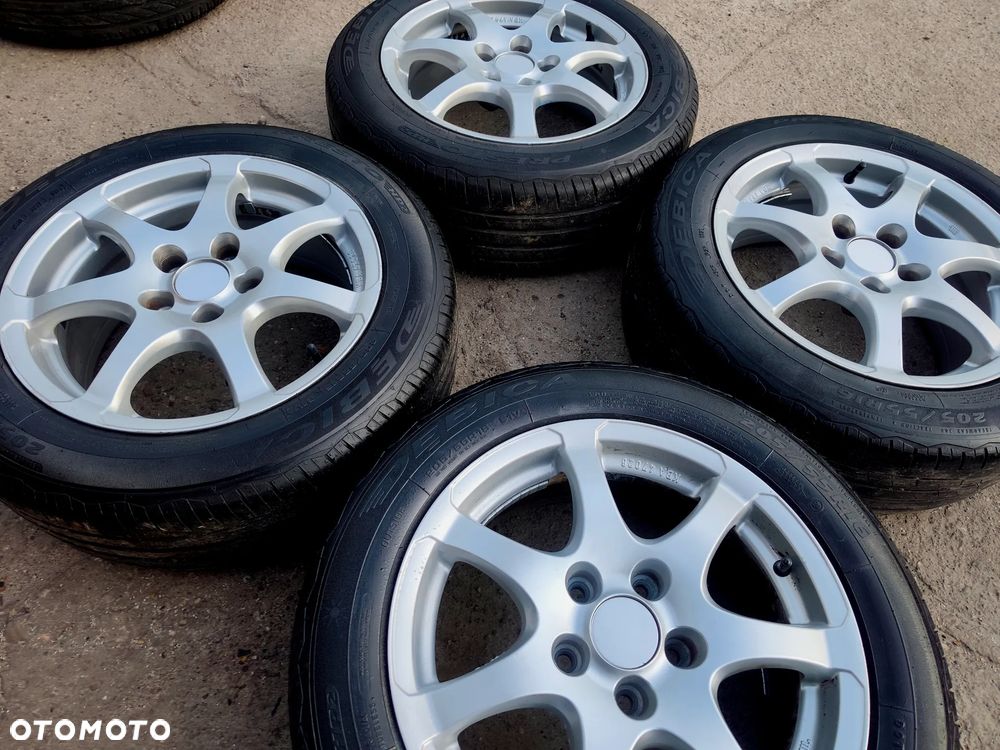 5x112 Felgi Aluminiowe Alufelgi 16 Koła Letnie Lato VW PASSAT B5 B6 B7 GOLF 5 V VI 6 VII 7 TOURAN CADDY JETTA SHARAN AUDI A6 C5 C6 A4 B5 B6 B7 B8 A3 8P 8V SKODA OCTAVIA II III SUPERB YETI SEAT EXEO LEON TOLEDO ALTEA ALHAMBRA MERCEDES BMW 8mm Legnica ALU-RAD 21r. 205/55 - 4