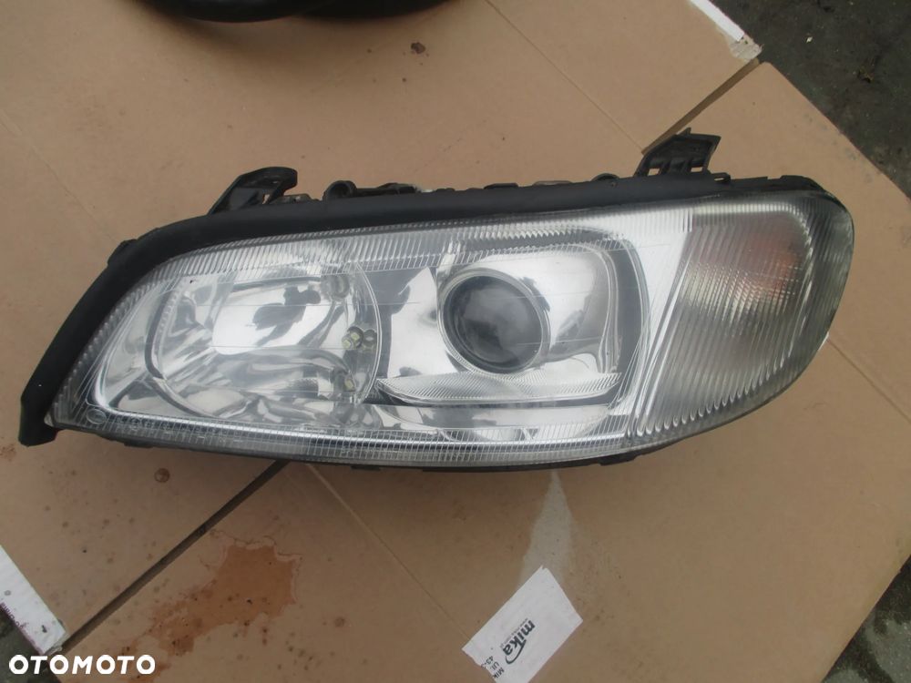 Lampa lewa OMEGA b lift  HELLA EUROPA - 1