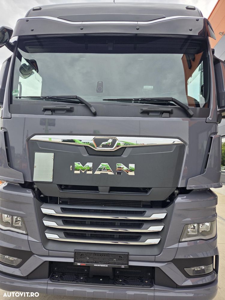 MAN TGX 18.510, 2023,126.353, AUTOMATA+RETARDER, 2 paturi, Cab inalta si lata cu SPOILERE, KIT BASCULARE, FRIGIDER, rulata in GERMANIA, Carte Identitate RAR, rezervor 600l aluminiu, volan piele, CA NOU, posibilitate leasing 4 ani-PROMOTIE 66.900 EUR+Tva - 2