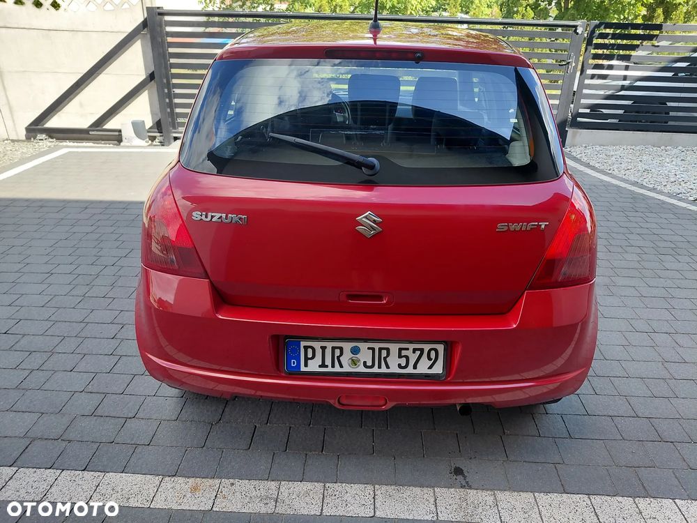 Suzuki Swift 1.3 Club - 4