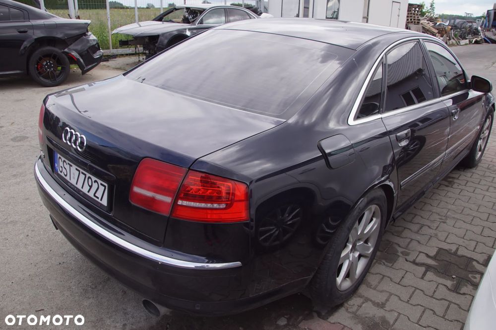 AUDI A8 D3 4.2 335 KM 2005  SILNIK BFM SKRZYNIA HHV  POJAZD NA CZĘŚCI. Tel. 692 106 889 silnik kompletny BFM, blok silnika, głowica lewa, głowica prawa, wał korbowy, wałek rozrządu, wałek ssący, wałek wydechowy, tłoki, korbowody, panewki, pierścienie tłokowe, miska olejowa, pompa oleju, smok olejowy, czujnik poziomu oleju, czujnik ciśnienia oleju, obudowa filtra oleju, chłodnica oleju, korek wlewu oleju, bagnet oleju, pokrywa zaworów lewa, pokrywa zaworów prawa, uszczelka pokrywy zaworów, kolektor ssący, kolektor wydechowy lewy, kolektor wydechowy prawy, przepustnica, listwa wtryskowa, wtryskiwacze, pompa paliwa, kosz pompy paliwa, regulator ciśnienia paliwa, filtr paliwa, przewody paliwowe, zbiornik paliwa, wlew paliwa, korek wlewu paliwa, obudowa filtra powietrza, przepływomierz, rura dolotowa, rezonator dolotu, przewody podciśnienia, zawór podciśnienia, odma, separator oleju, cewki zapłonowe, świece zapłonowe, wiązka silnika, sterownik silnika, moduł zapłonowy, czujnik położenia wału, czujnik położenia wałka rozrządu, czujnik temperatury silnika, czujnik spalania stukowego, czujnik ciśnienia, sonda lambda, alternator, rozrusznik, pompa wody, termostat, obudowa termostatu, chłodnica wody, wentylator chłodnicy lewy, wentylator chłodnicy prawy, obudowa wentylatorów, zbiornik wyrównawczy, korek zbiornika wyrównawczego, przewody chłodnicy, węże układu chłodzenia, nagrzewnica, przewody nagrzewnicy, koło pasowe wału, rolka prowadząca, rolka napinacza, napinacz paska, pasek osprzętu, łapa silnika lewa, łapa silnika prawa, poduszka silnika lewa, poduszka silnika prawa, osłona silnika górna, osłona silnika dolna, skrzynia biegów HHV, sterownik skrzyni biegów, mechatronika skrzyni, konwerter skrzyni biegów, sprzęgło hydrokinetyczne, miska skrzyni biegów, chłodnica oleju skrzyni, przewody oleju skrzyni, wybierak biegów, lewarek zmiany biegów, linka wybieraka, poduszka skrzyni biegów, łapa skrzyni biegów, wał napędowy, podpora wału, przegub wału, skrzynia rozdzielcza, reduktor, dyferencjał przedni, dyferencjał tylny, most przedni, most tylny, półoś przednia lewa, półoś przednia prawa, półoś tylna lewa, półoś tylna prawa, przegub zewnętrzny, przegub wewnętrzny, flansza napędowa, piasta przednia lewa, piasta przednia prawa, piasta tylna lewa, piasta tylna prawa, łożysko koła przednie, łożysko koła tylne, sanki przednie, sanki tylne, belka przednia, belka tylna, amortyzator przedni lewy, amortyzator przedni prawy, amortyzator tylny lewy, amortyzator tylny prawy, miech pneumatyczny przedni lewy, miech pneumatyczny przedni prawy, miech pneumatyczny tylny lewy, miech pneumatyczny tylny prawy, kolumna pneumatyczna przednia lewa, kolumna pneumatyczna przednia prawa, kompresor zawieszenia, pompa zawieszenia, sterownik zawieszenia, blok zaworowy zawieszenia, czujnik poziomowania, zbiornik powietrza zawieszenia, przewody pneumatyczne, wahacz przedni górny lewy, wahacz przedni górny prawy, wahacz przedni dolny lewy, wahacz przedni dolny prawy, wahacz tylny lewy, wahacz tylny prawy, zwrotnica przednia lewa, zwrotnica przednia prawa, zwrotnica tylna lewa, zwrotnica tylna prawa, stabilizator przedni, stabilizator tylny, łącznik stabilizatora lewy, łącznik stabilizatora prawy, drążek kierowniczy lewy, drążek kierowniczy prawy, końcówka drążka lewa, końcówka drążka prawa, maglownica, przekładnia kierownicza, pompa wspomagania, zbiornik płynu wspomagania, przewody wspomagania, kolumna kierownicza, krzyżak kolumny kierowniczej, zacisk hamulcowy przedni lewy, zacisk hamulcowy przedni prawy, zacisk hamulcowy tylny lewy, zacisk hamulcowy tylny prawy, jarzmo zacisku przednie, jarzmo zacisku tylne, tarcza hamulcowa przednia lewa, tarcza hamulcowa przednia prawa, tarcza hamulcowa tylna lewa, tarcza hamulcowa tylna prawa, klocki hamulcowe, pompa hamulcowa, serwo hamulcowe, moduł ABS, pompa ABS, czujnik ABS przedni, czujnik ABS tylny, przewód hamulcowy, linka hamulca postojowego, silniczek hamulca postojowego, sterownik hamulca postojowego, felga aluminiowa, koło kompletne, śruba koła, dekielek felgi, czujnik ciśnienia opony, zderzak przedni, zderzak tylny, belka zderzaka przedniego, belka zderzaka tylnego, absorber zderzaka, kratka zderzaka lewa, kratka zderzaka prawa, grill przedni, atrapa chłodnicy, ramka grilla, emblemat Audi, emblemat A8, maska, zawias maski lewy, zawias maski prawy, zamek maski, linka otwierania maski, siłownik maski, błotnik przedni lewy, błotnik przedni prawy, nadkole przednie lewe, nadkole przednie prawe, nadkole tylne lewe, nadkole tylne prawe, drzwi przednie lewe, drzwi przednie prawe, drzwi tylne lewe, drzwi tylne prawe, klamka zewnętrzna przednia lewa, klamka zewnętrzna przednia prawa, klamka zewnętrzna tylna lewa, klamka zewnętrzna tylna prawa, klamka wewnętrzna, zamek drzwi przednich, zamek drzwi tylnych, zawias drzwi, ogranicznik drzwi, mechanizm szyby przedni lewy, mechanizm szyby przedni prawy, mechanizm szyby tylny lewy, mechanizm szyby tylny prawy, silniczek szyby, szyba drzwi przednia lewa, szyba drzwi przednia prawa, szyba drzwi tylna lewa, szyba drzwi tylna prawa, szyba przednia, szyba tylna, szyba boczna lewa, szyba boczna prawa, uszczelka drzwi, uszczelka szyby, listwa drzwi, listwa progowa, listwa chromowana, próg lewy, próg prawy, dach, podszybie, pas przedni, wzmocnienie czołowe, osłona pod silnik, osłona podwozia, osłona nadkola, klapa bagażnika, zamek klapy bagażnika, zawias klapy bagażnika, siłownik klapy bagażnika, mechanizm domykania klapy, lusterko lewe, lusterko prawe, wkład lusterka lewy, wkład lusterka prawy, silniczek lusterka, kierunkowskaz lusterka, reflektor przedni lewy, reflektor przedni prawy, lampa tylna lewa, lampa tylna prawa, lampa klapy lewa, lampa klapy prawa, kierunkowskaz przedni, światło przeciwmgielne lewe, światło przeciwmgielne prawe, przetwornica xenon, żarnik xenon, moduł reflektora, sterownik poziomowania lamp, spryskiwacz reflektora lewy, spryskiwacz reflektora prawy, zbiornik płynu spryskiwaczy, pompka spryskiwaczy, dysza spryskiwacza, mechanizm wycieraczek, silnik wycieraczek, ramię wycieraczki lewe, ramię wycieraczki prawe, fotel kierowcy, fotel pasażera, kanapa tylna, oparcie tylnej kanapy, zagłówek przedni, zagłówek tylny, podłokietnik przedni, podłokietnik tylny, stelaż fotela, silniczek fotela, sterownik fotela, mata grzewcza fotela, boczek drzwi przedni lewy, boczek drzwi przedni prawy, boczek drzwi tylny lewy, boczek drzwi tylny prawy, deska rozdzielcza, konsola środkowa, tunel środkowy, schowek pasażera, kierownica, poduszka kierownicy, manetka kierunkowskazów, manetka wycieraczek, taśma kierownicy, licznik, zegary, wyświetlacz centralny, ekran nawigacji, radio, jednostka multimedialna, zmieniarka płyt, wzmacniacz audio, głośnik przedni, głośnik tylny, subwoofer, antena radiowa, moduł nawigacji, panel klimatyzacji, kratka nawiewu lewa, kratka nawiewu prawa, kratka nawiewu środkowa, dmuchawa nawiewu, rezystor dmuchawy, silniczek klapy nawiewu, parownik klimatyzacji, skraplacz klimatyzacji, osuszacz klimatyzacji, sprężarka klimatyzacji, - 9