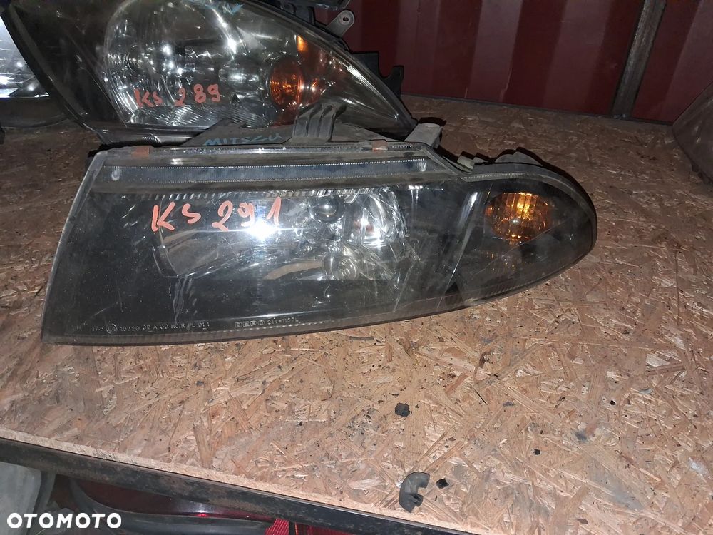 Reflektor LAMPA PRZÓD LEWY LEWA MITSUBISHI CARISMA - 1