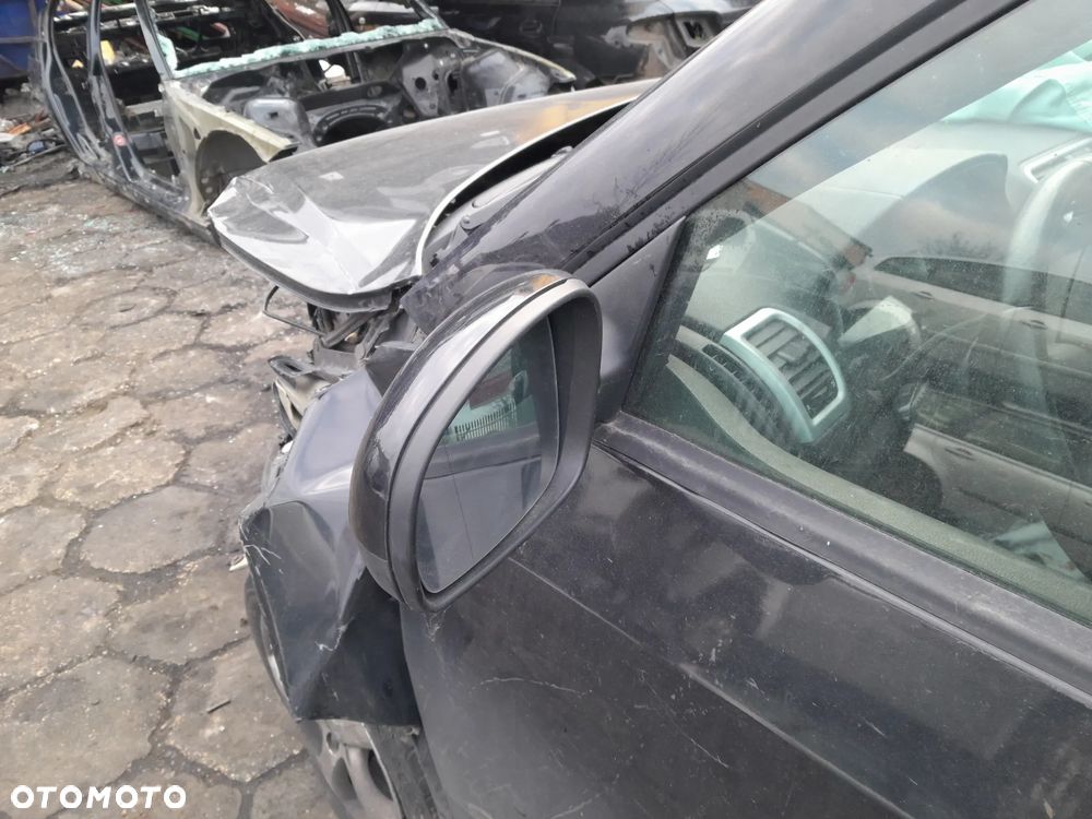 Lusterko zewnętrzne lewe elektryczne SKODA Fabia II 07-14r. 9910 - 3