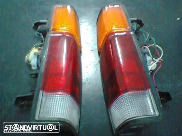 conjunto farolins de trás Nissan pickup D21 cx de chapa ( Altura 41cm ) - 1