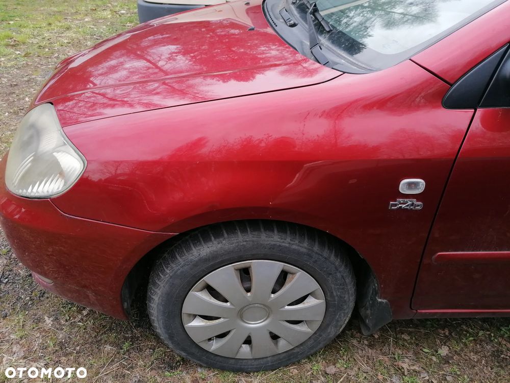 BLOTNIK PRAWY LEWY TOYOTA COROLLA E12 3N8 - 3