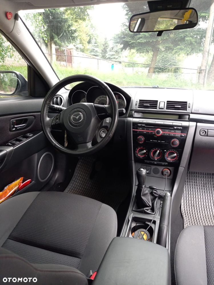 Mazda 3 1.6 Exclusive + - 7