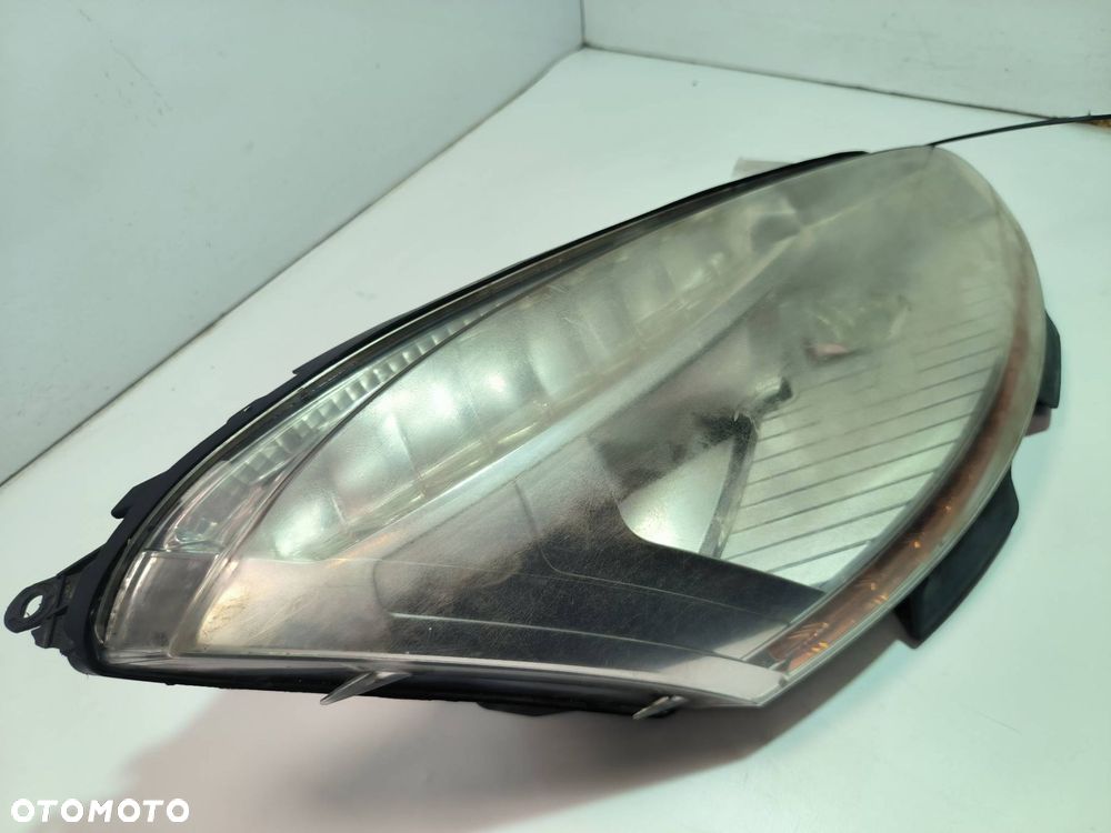 LAMPA PRAWA PRZÓD CITROEN C4 Picasso I 16298200 - 3