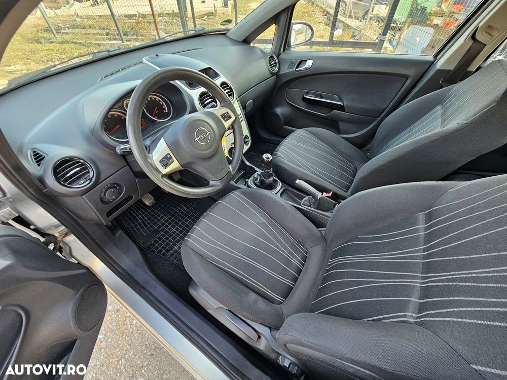 Opel Corsa 1.2i Cosmo - 16