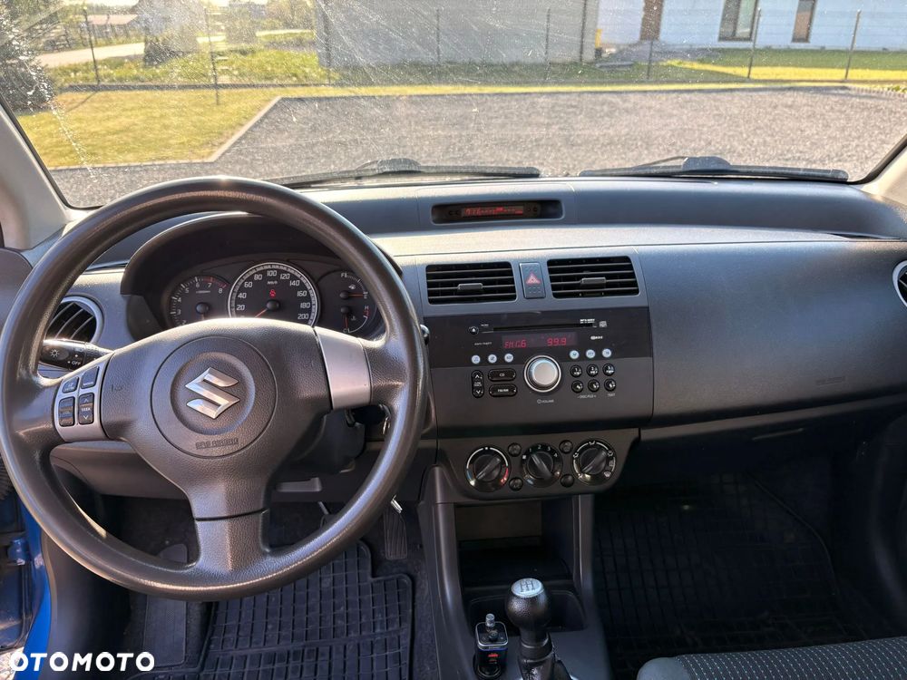Suzuki Swift 1.3 Club - 12