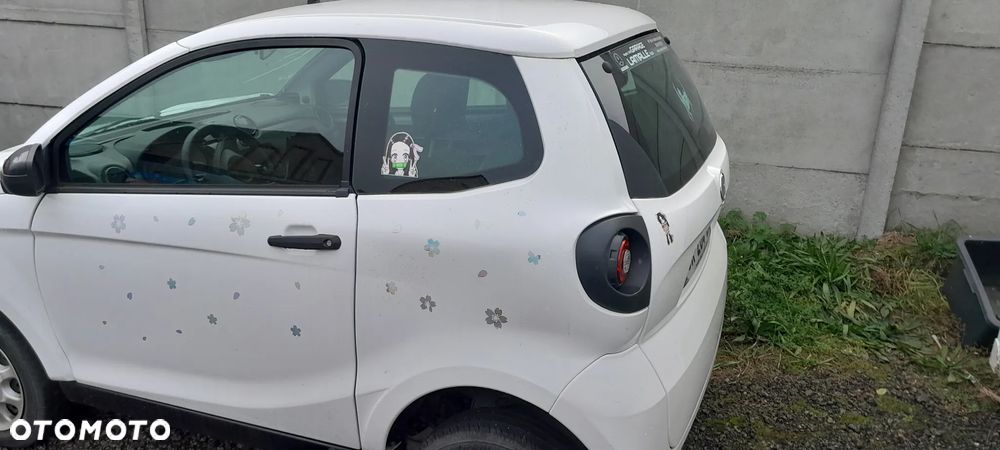 AIXAM MINAUTO 2019 ROK BŁOTNIK TYŁ LEWY  ĆWIARTKA - 1