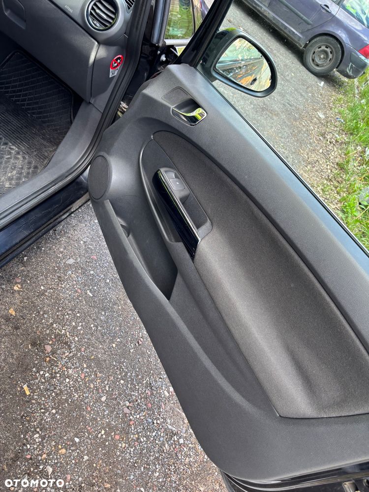 Opel Corsa 1.2 16V Cosmo - 6