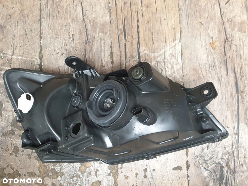 Oryginalna lampa lewa reflektor Hyundai Getz 92110-1C010 - 9