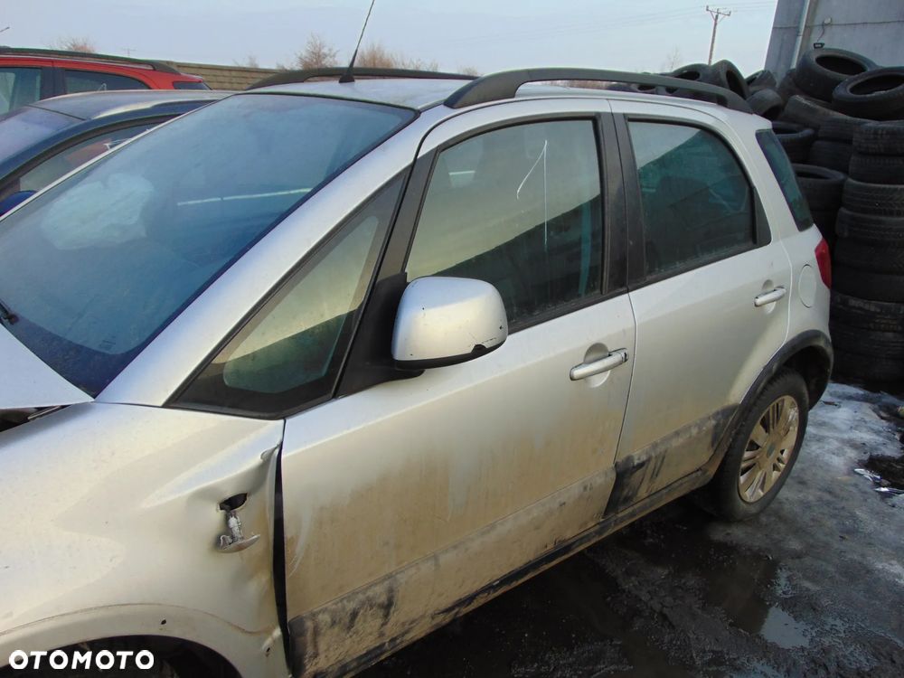DRZWI LEWE PRZÓD PRZEDNIE SUZUKI SX4 FIAT SEDICI ZCC Z LISTWĄ - 1