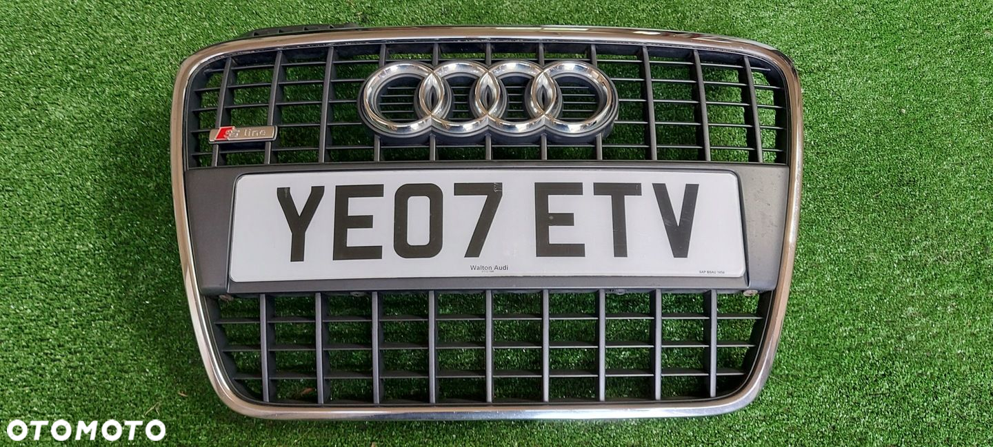 ATRAPA GRILL PODKŁADKA POD TABLICĘ AUDI A4 B7 S-LINE 8E0853651M - 2