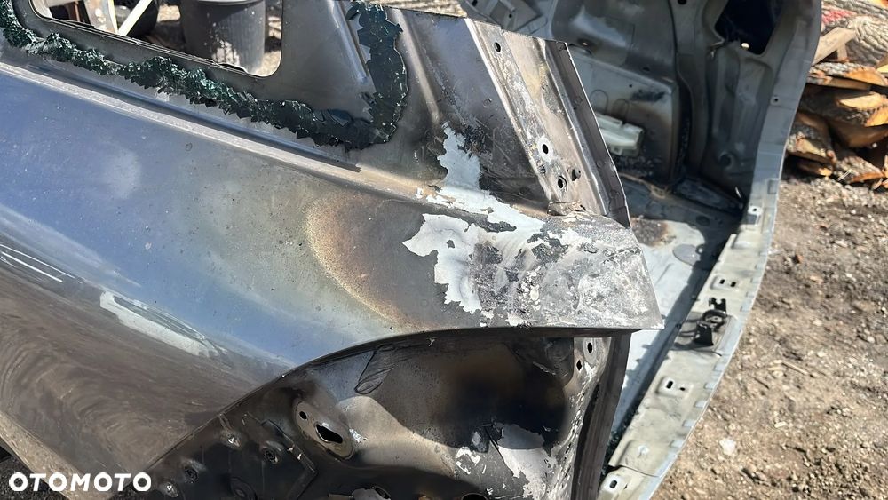 BŁOTNIK LEWY TYŁ PAS WANNA RENAULT CLIO IV KOMBI - 2
