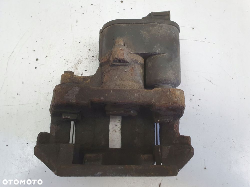 Volvo S60 II S80 II V60 V70 III XC70 II TYLNY ZACISK HAMULCOWY lewy tył - 9