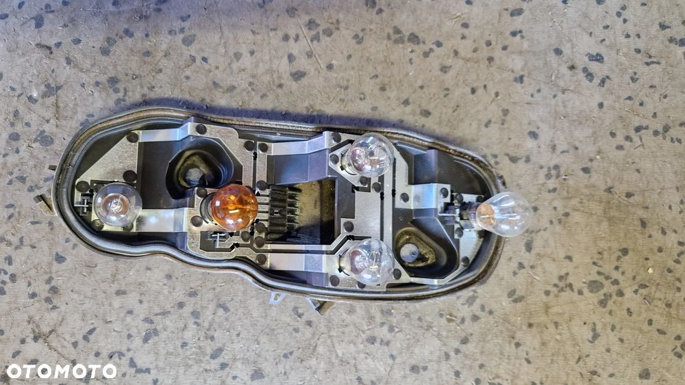 OPEL CORSA D 3d WKŁAD LAMPY TYŁ LEWY - 2