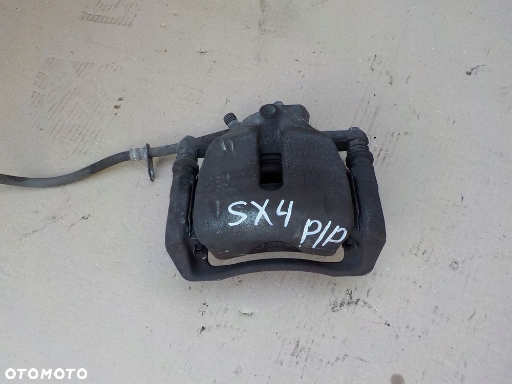 zacisk hamulcowy prawy przód suzuki sx4 1,6 ddis - 1