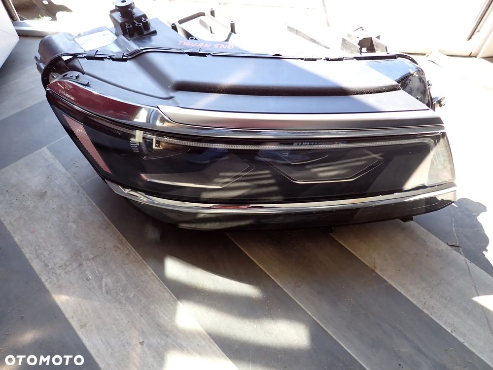 VOLKSWAGEN TIGUAN 5NA LAMPA PRAWY PRZÓD EUROPA 5NB941082D - 1