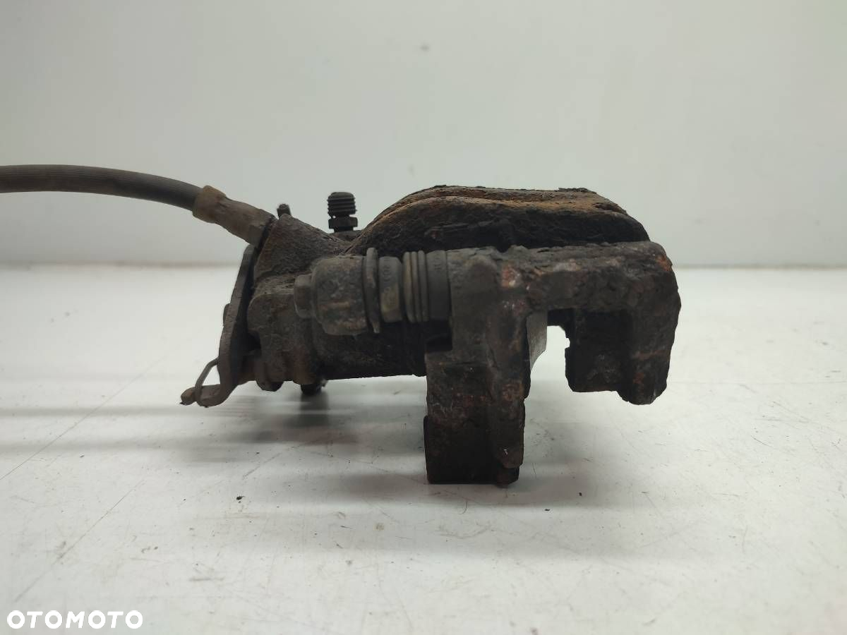 ZACISK HAMULCOWY TYŁ PRAWY JARZMO FORD MONDEO MK3 III - 5