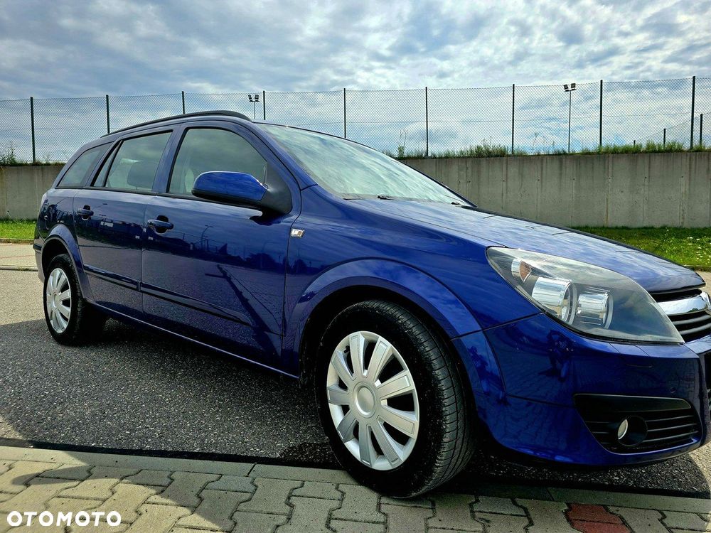 Opel Astra 1.8 Caravan Edition - 17