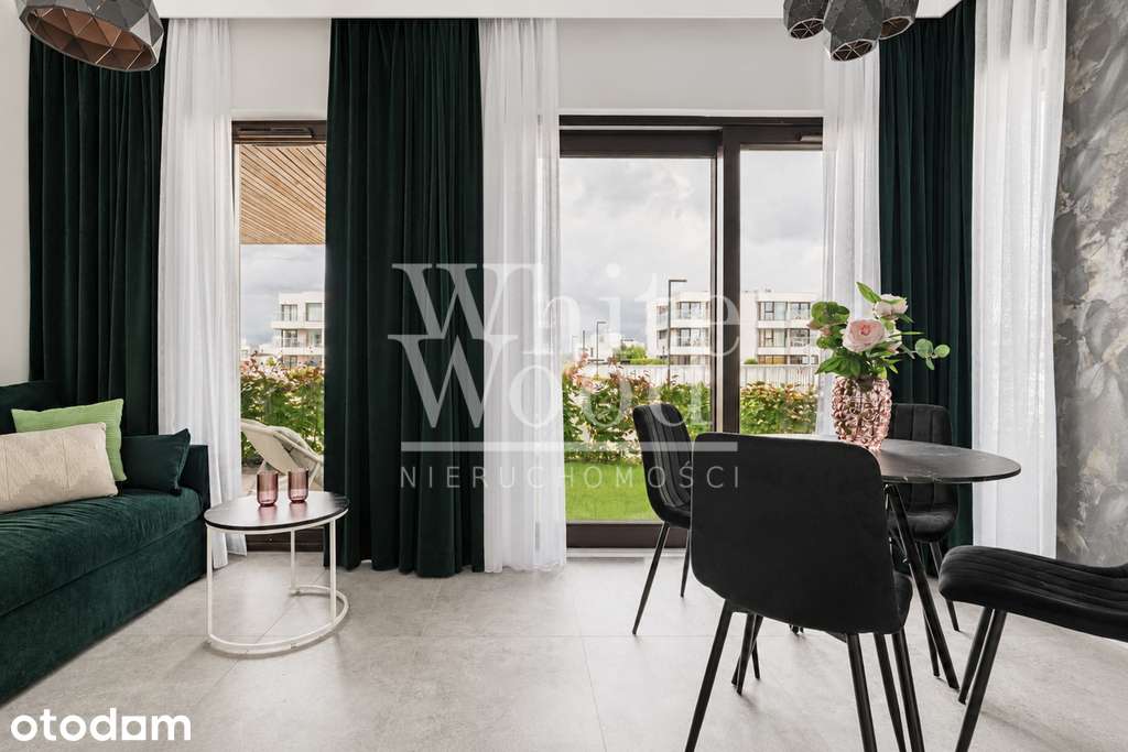 Nadmorski apartament z ogródkiem przy marinie