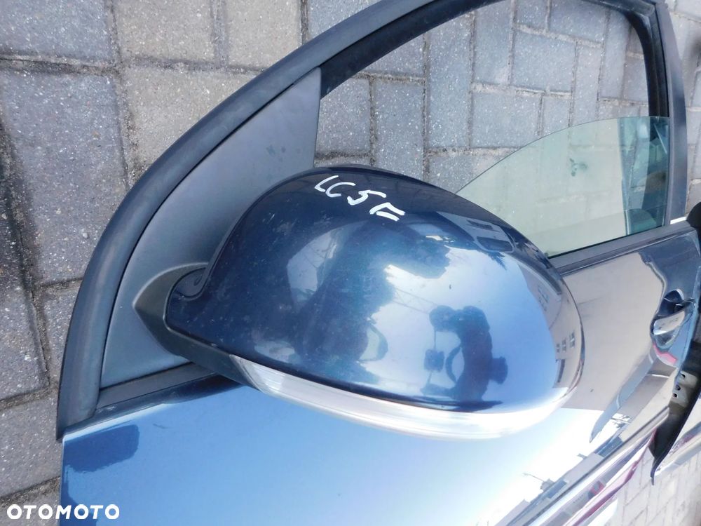 lusterko lewe W GOLF V HB  LC5F Europa