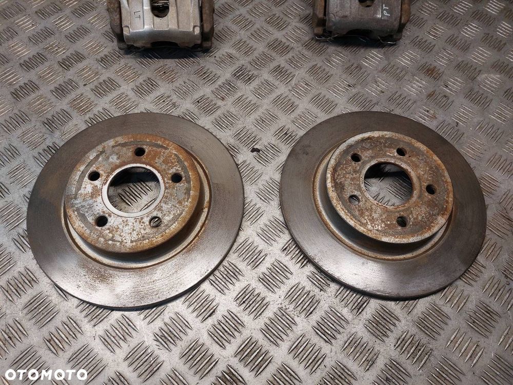 TARCZE HAMULCOWE TYŁ + KLOCKI + ZACISKI VOLVO S40 II - 2