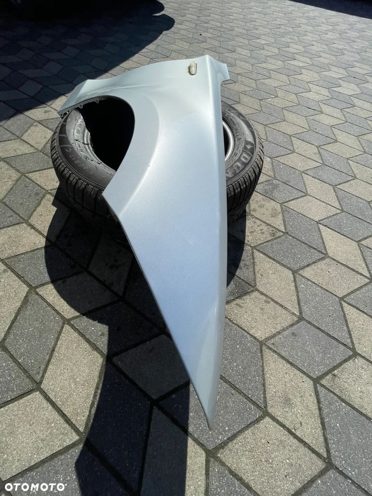 Bmw E87 Błtonik Prawy titansilber - 2