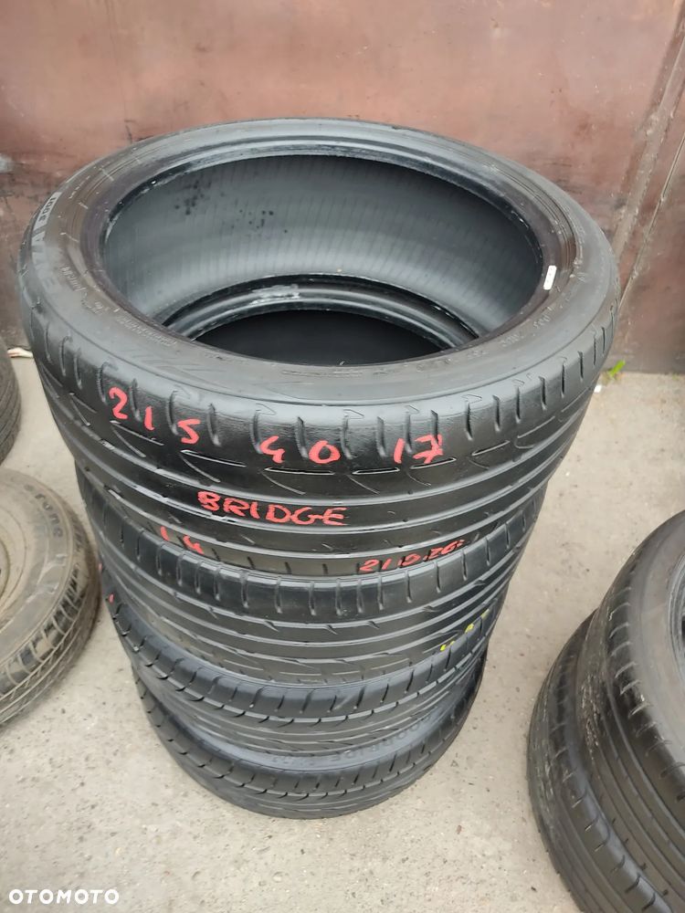 215/40R17 87W OPONY Letnie Lato BRIDGESTONE POTENZA S001 5mm DUNLOP Sport MAXX RT Legnica ALU-RAD 5-6mm 215/40 - 3