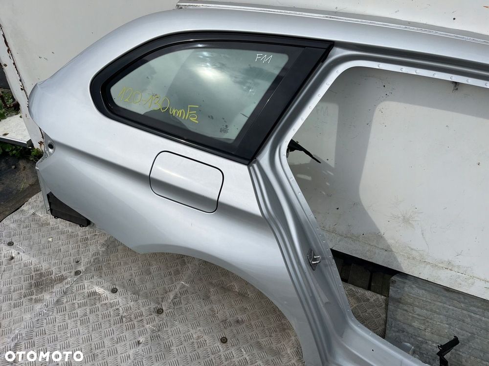 Blotnik cwiartka szyba poszycie prawy tyl BMW F11 354 120-130 umFe LADNY - 4