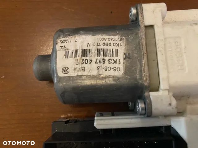 SILNICZEK SZYBY LEWY SKODA OCTAVIA II 1K0959792J - 2