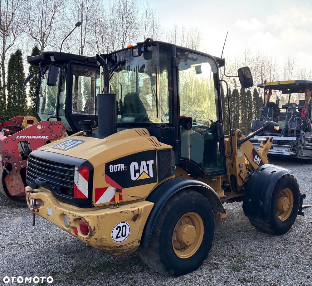 Caterpillar 907H2 rekin 4x4 łyzka dzielona z niemiec - 1