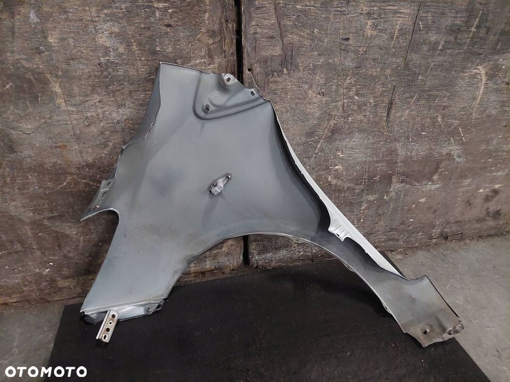 BŁOTNIK PRAWY PRZÓD TOYOTA YARIS II LIFT 1F8 - 5