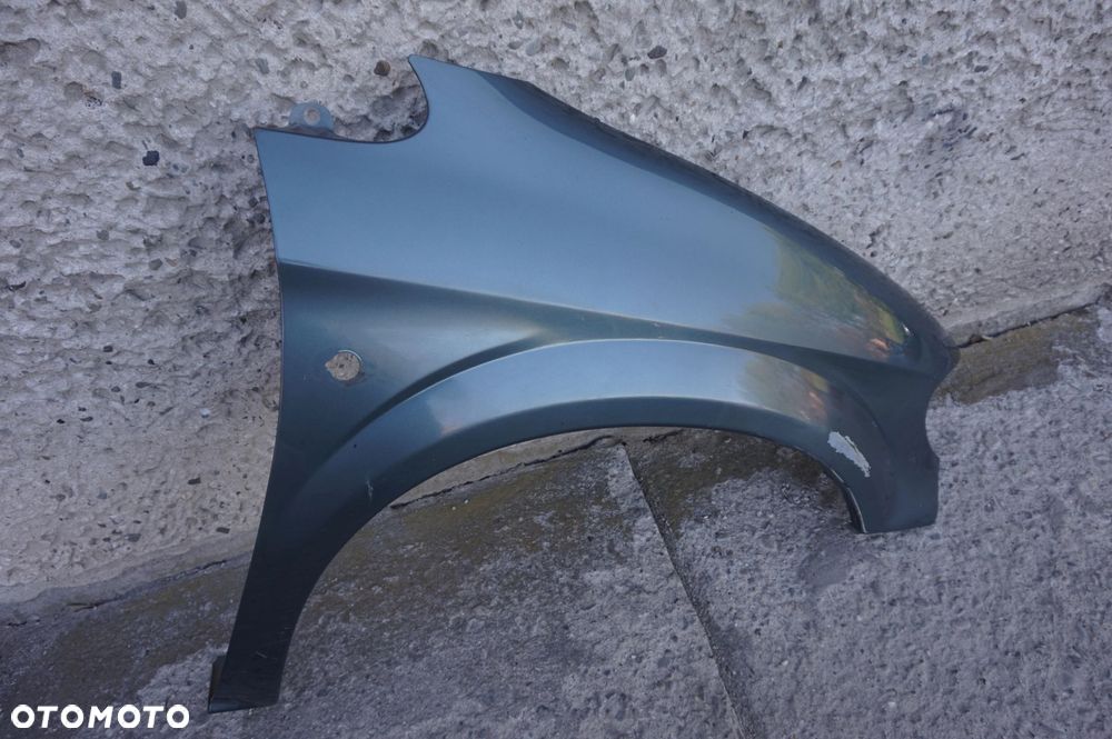 BŁOTNIK PRZEDNI PRAWY GRAND VOYAGER IV - 4