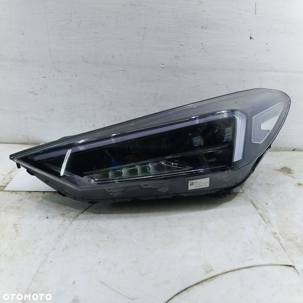 TUCSON III LIFT REFLEKTOR LEWY LAMPA LEWA 92101D7700 EUROPA