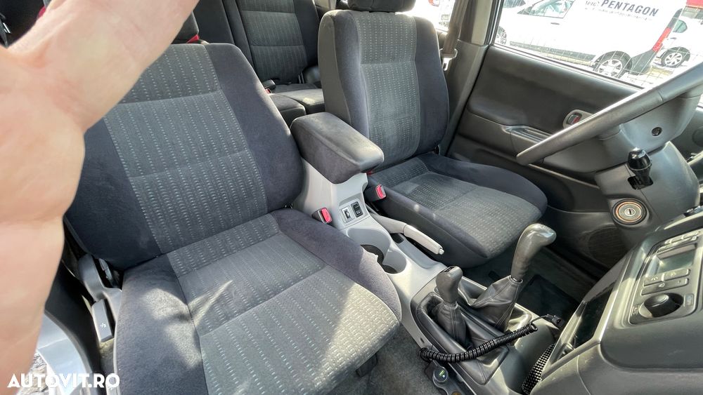 Mitsubishi Pajero Sport 2.5 TD GLS - 7