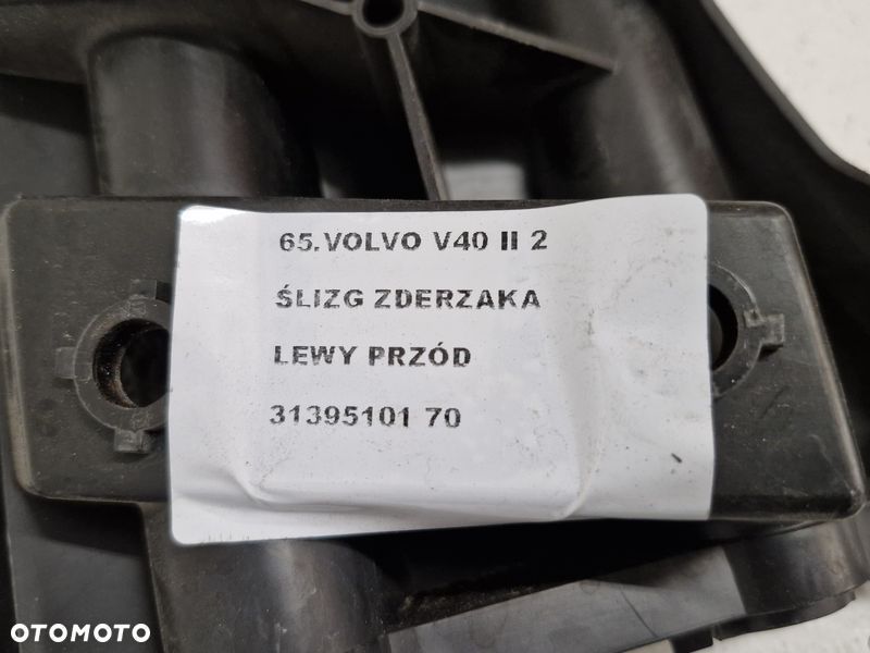 VOLVO V40 2 II ŚLIZG UCHWYT ZDERZAKA LEWY PRZÓD PRZEDNI 31395101 - 6