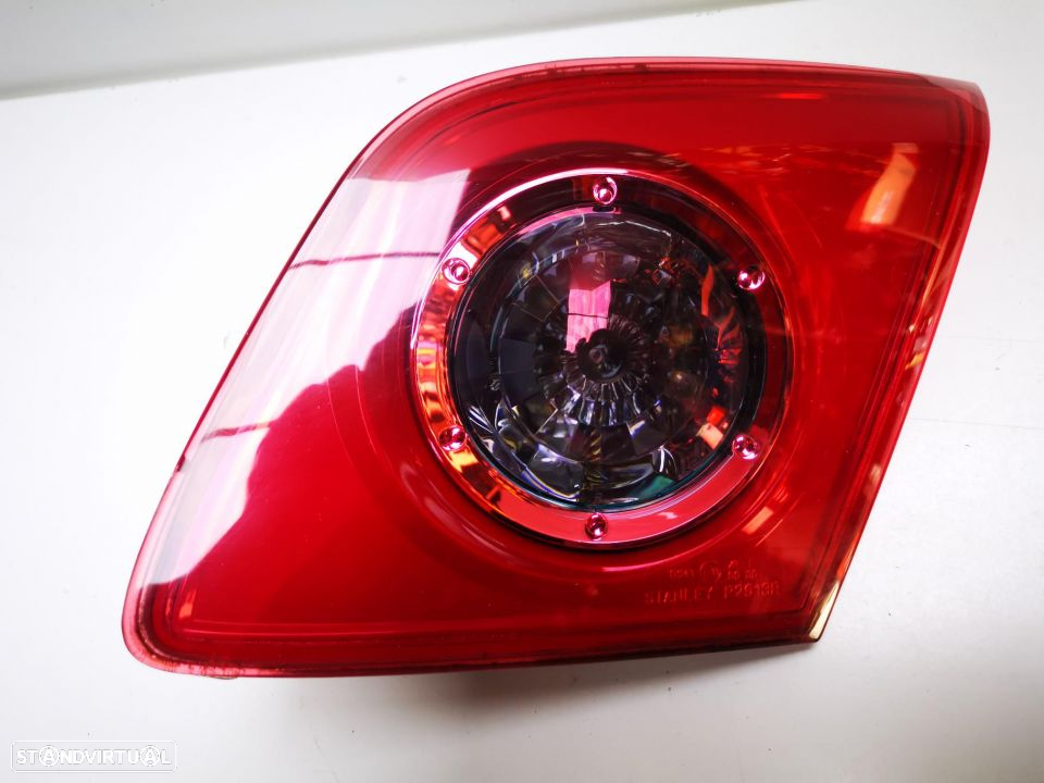 MAZDA 3 2006 FAROLIM DA MALA ESQ / DTO - FT129 FT130 - 2