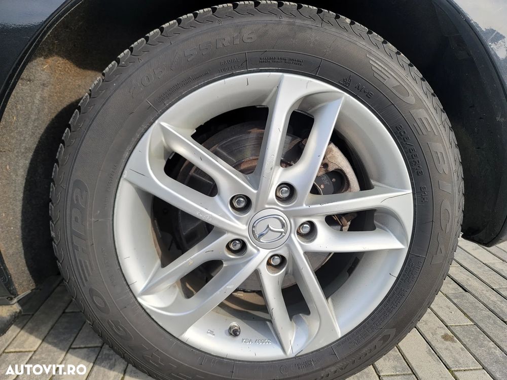 Mazda 3 2.0 MZR DISI Sports-Line - 2