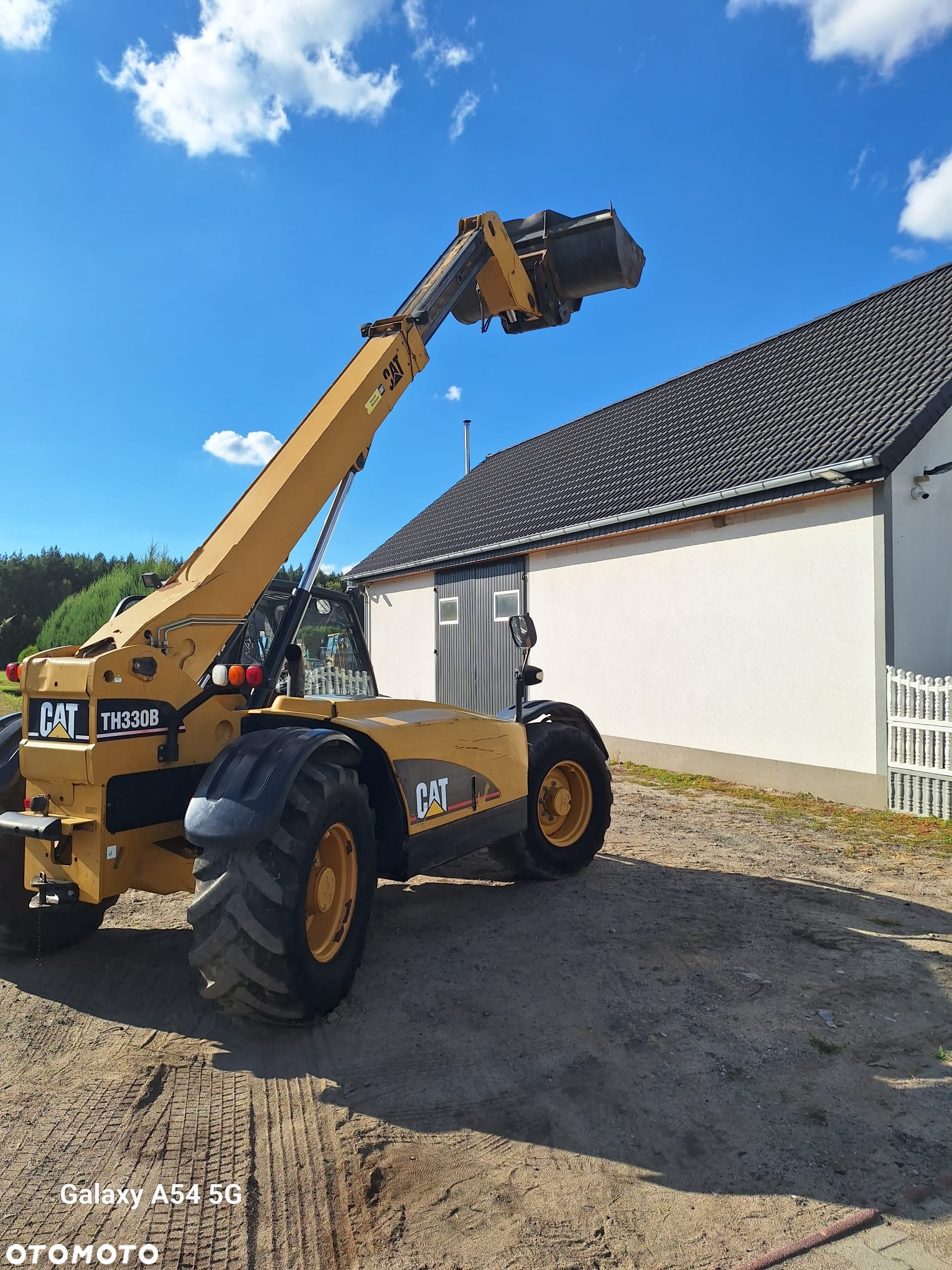 Caterpillar TH 330B - 9
