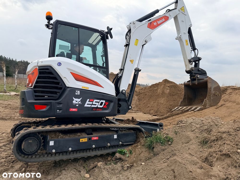 Bobcat Minikoparka Bobcat e50Z 5ton e55 e60 Cat 303.5 304  305 3xłyżki Ramię LOONG dodatkowe linie hydr wyjścia AUX1 + 2 przeciw waga MAX-dociążenie gąsienice 85% od nowości 1 właściciel z Niemiec Auto IDLEE po serwisie Widły wiertnica grabie i inne za dopłatą Szybkozłącze hydr Miller łyżka przedsiębierna Pług  Kubota Takeuchi Jcb - 15