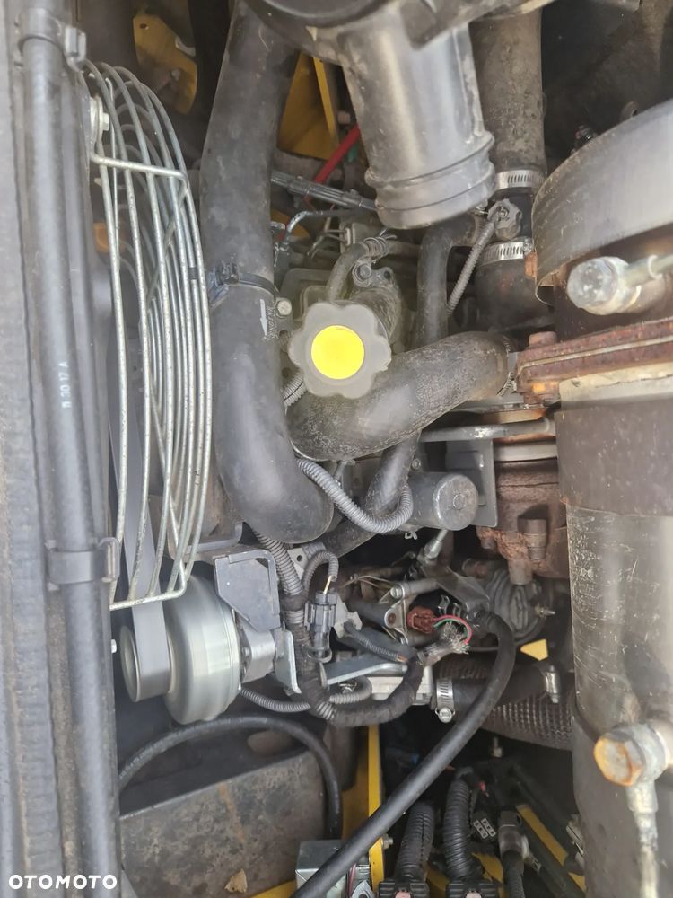 New Holland L216 - 10