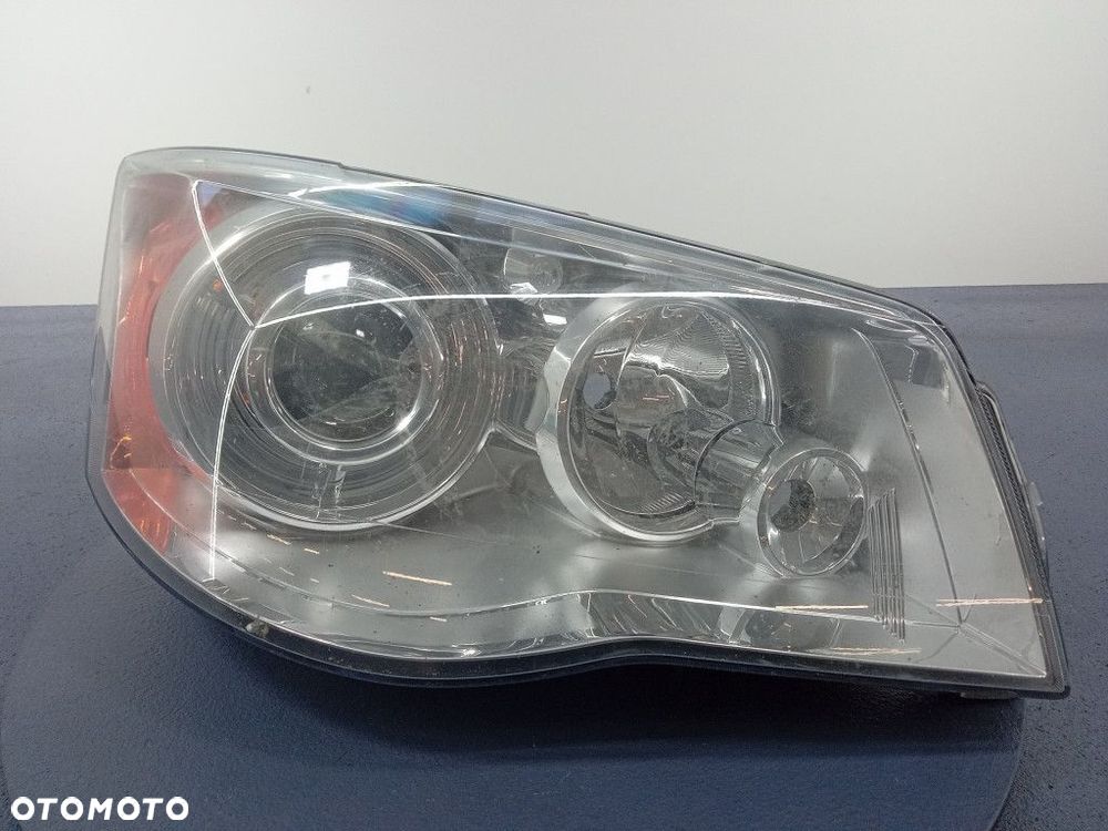 VOYAGER V 07- REFLEKTOR PRAWY XENON 05113334AE - 1