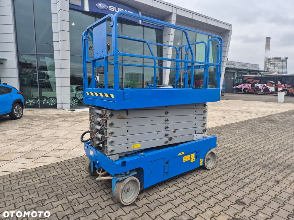 Genie GS 4047 / 1 WŁ / SERWISOWANY / AŻ 13.7M WYSOKOŚĆ / MAX ŁADOWNOŚĆ 350KG / MOŻLIWY TRANSPORT - 13