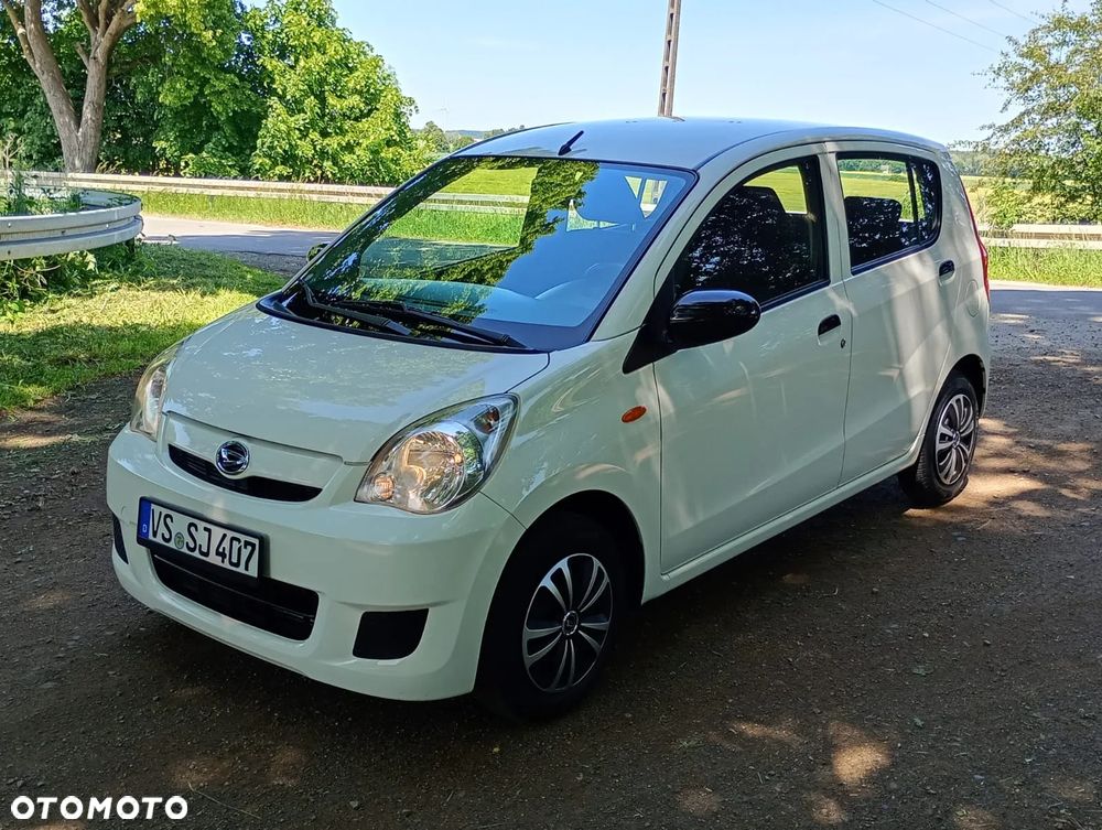 Daihatsu Cuore 1.0 Top - 1